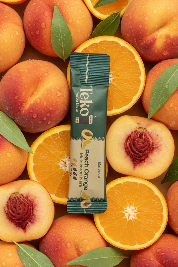 Teko Peach Orange flavor packet surrounded by peaches and oranges